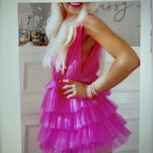 From SassyShortcake online for the Era’s Tour. Bright pink, size medium.